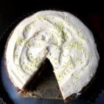 A classic homemade carrot cake recipe with raisins, purple carrots, orange carrots, toasted walnuts, and cream cheese frosting - award winning carrot cake with an incredibly moist crumb revealed in every slice.