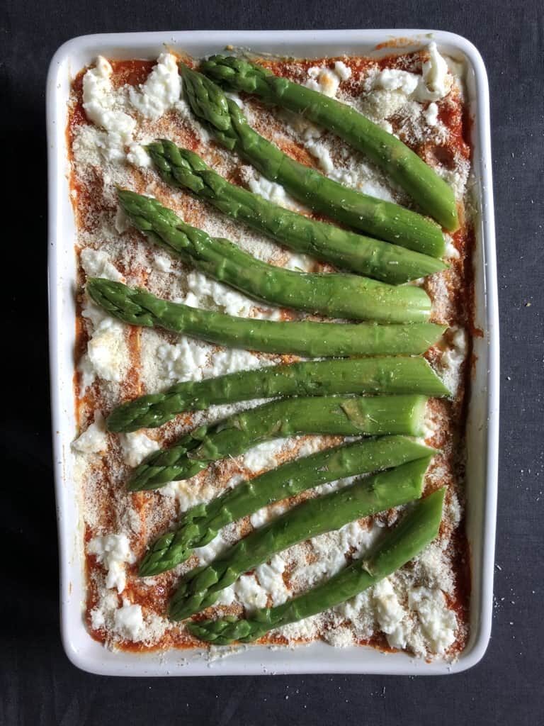 unbaked (but decorated with asparagus spears) speck and asparagus lasagna