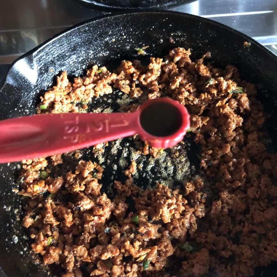 Adding Worcestershire sauce to beyond taco meat.