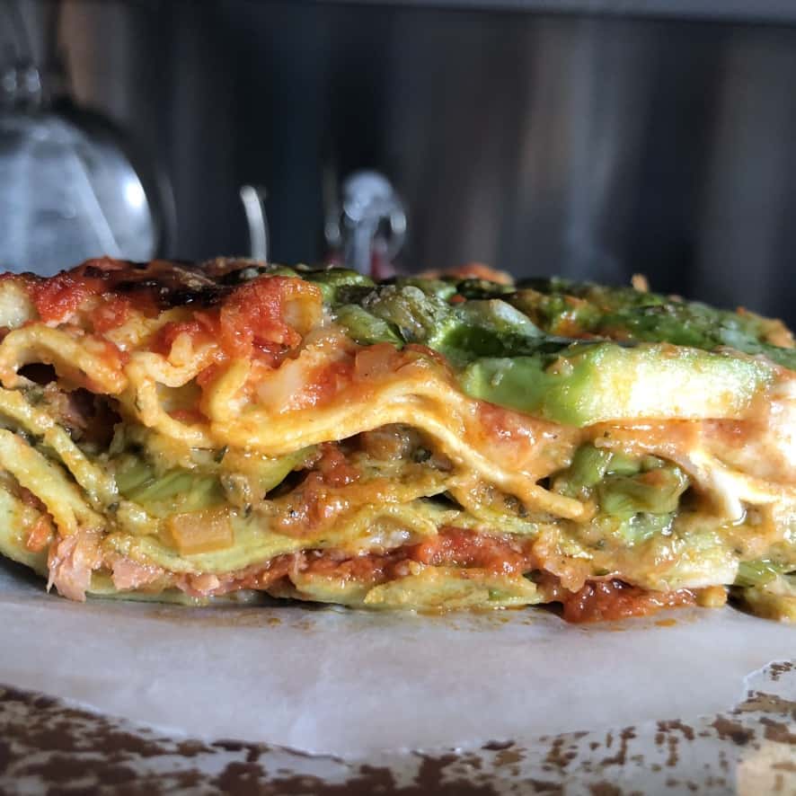 side view of a beautifully layered slab of Speck and Asparagus Lasagna