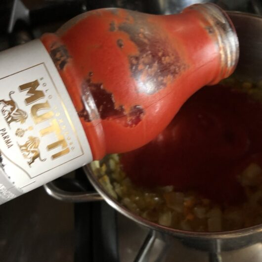 a special jar of Mutti Tomato passata with tomatoes from a specific farm in Italy