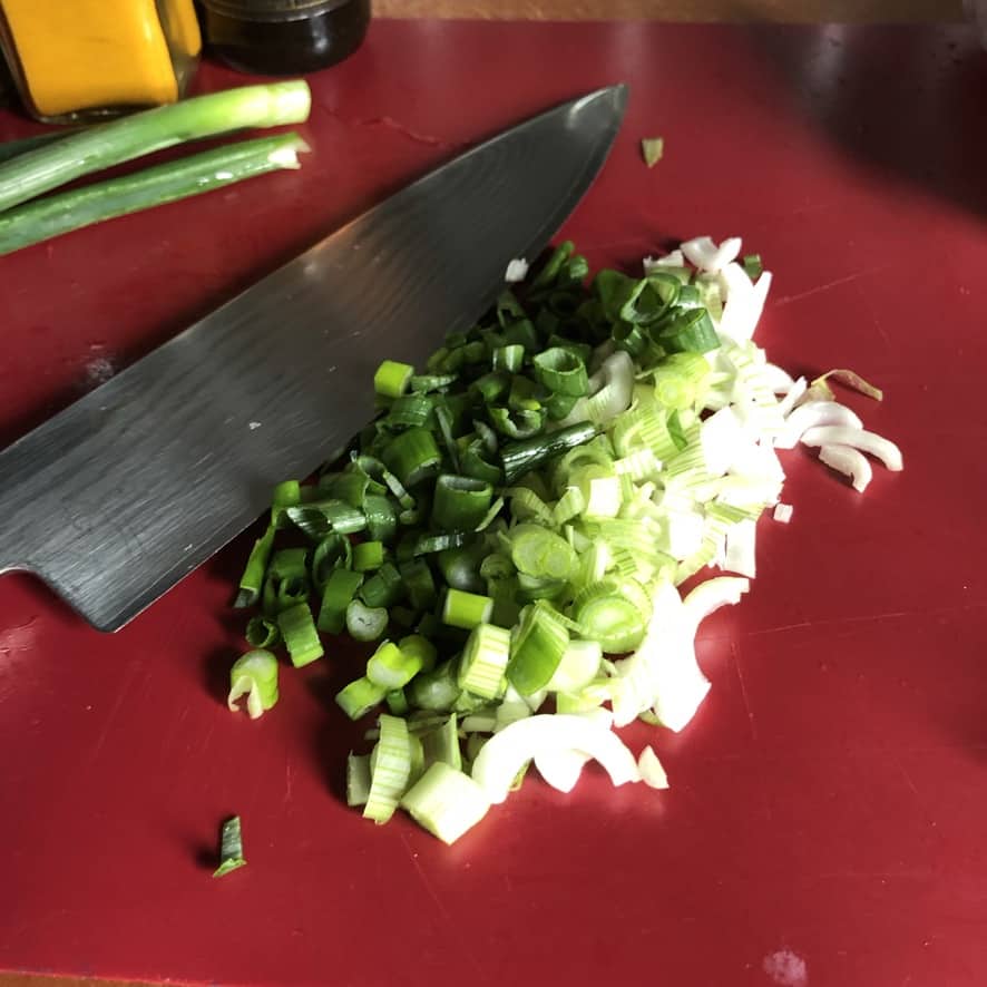 chopped scallions to season the vegetarian taco meat.