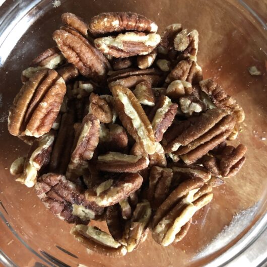 toasted pecan halves in a bowl