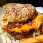 Extra beefy-tasting Beyond Burger on a homemade sesame and poppy seed potato bun.