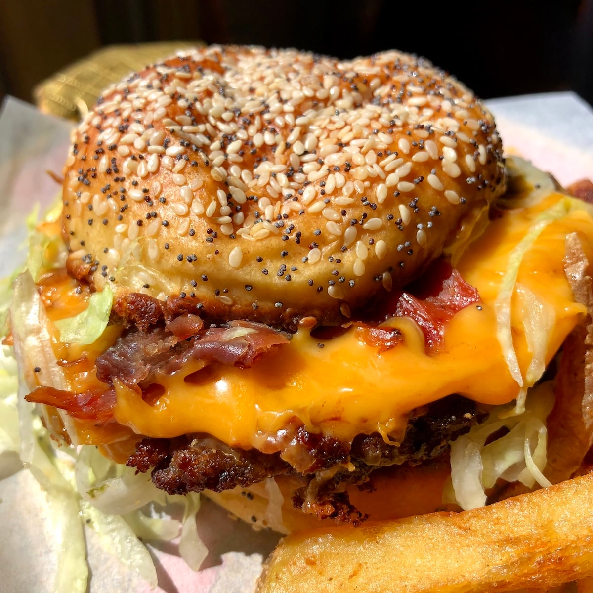 Extra beefy-tasting Beyond Burger on a homemade sesame and poppy seed potato bun.