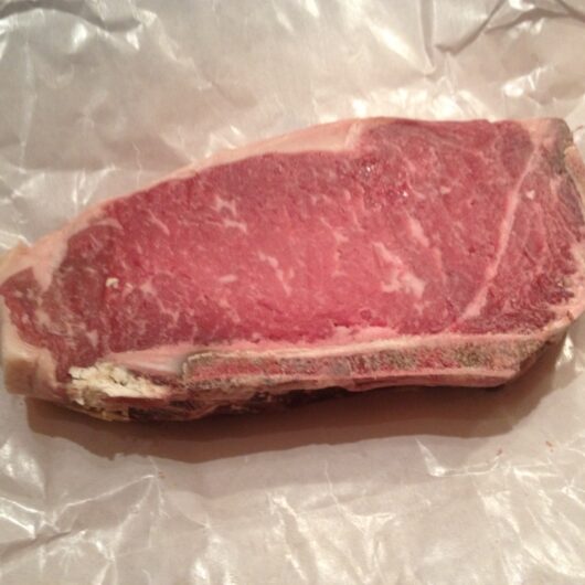 Raw NY strip steak