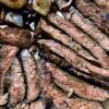 the best perfectly cooked carne asada steak with caramelized onions on a sheet pan