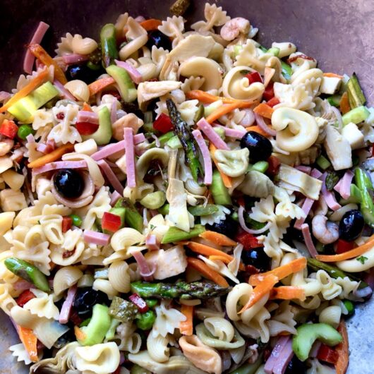 pasta salad in a very large wok