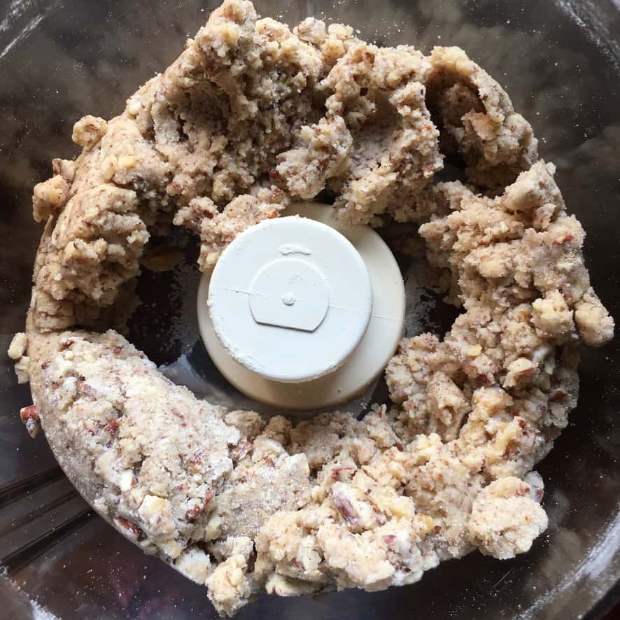 pecan shortbread crust ingredients in a food processor mixed together