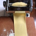 the sheet being rolled and getting to desired thinness in the pasta machine