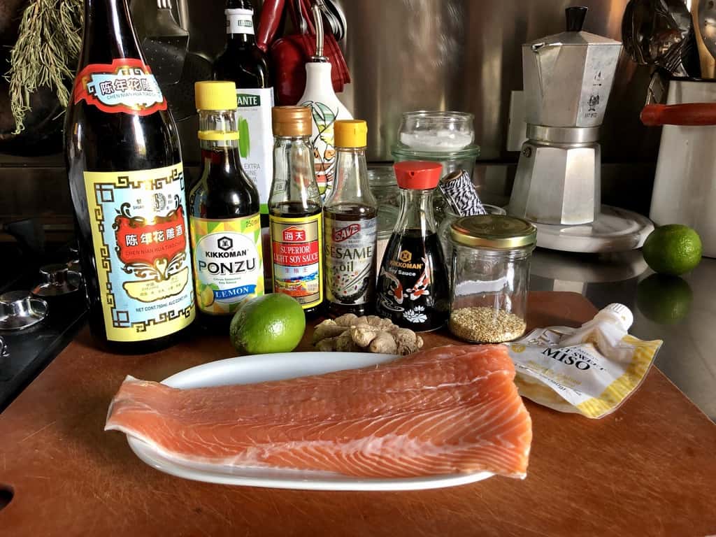 soy ginger miso salmon ingredients on a cutting board