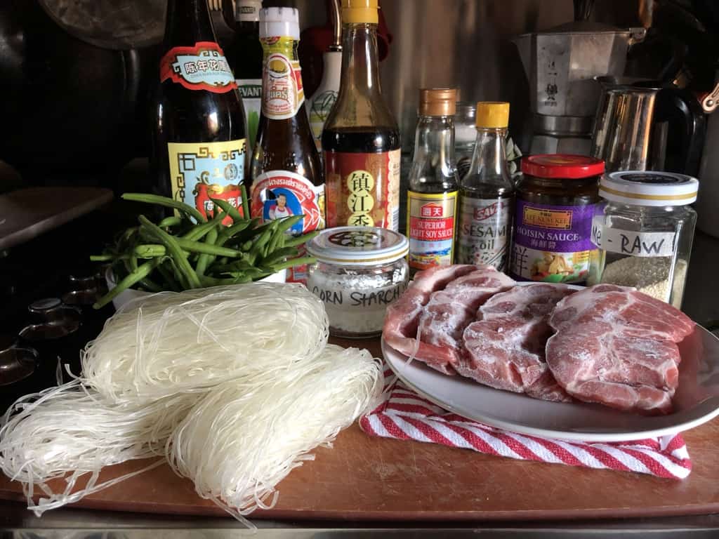 Chinese Pork and Green Bean Stir-Fry with Glass noodles ingredients on a cutting board