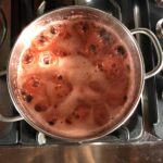 cooking the strawberries (foamy looking)