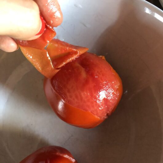 peeling the tomato skin off