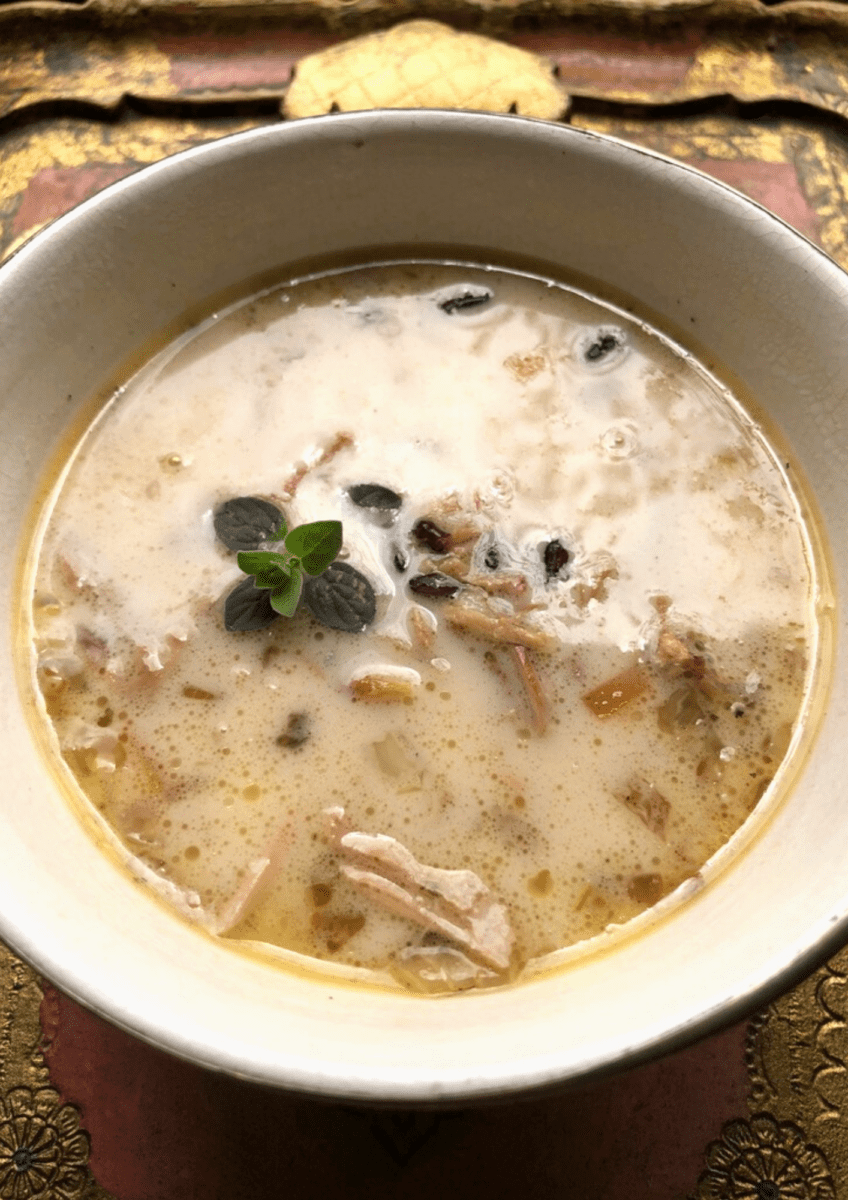 a bowl of turkey and wild rice soup closeup