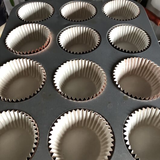 foil lined muffin tins in a muffin pan