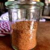 a small glass Weck jar with homemade BBQ seasoning spice rub in it