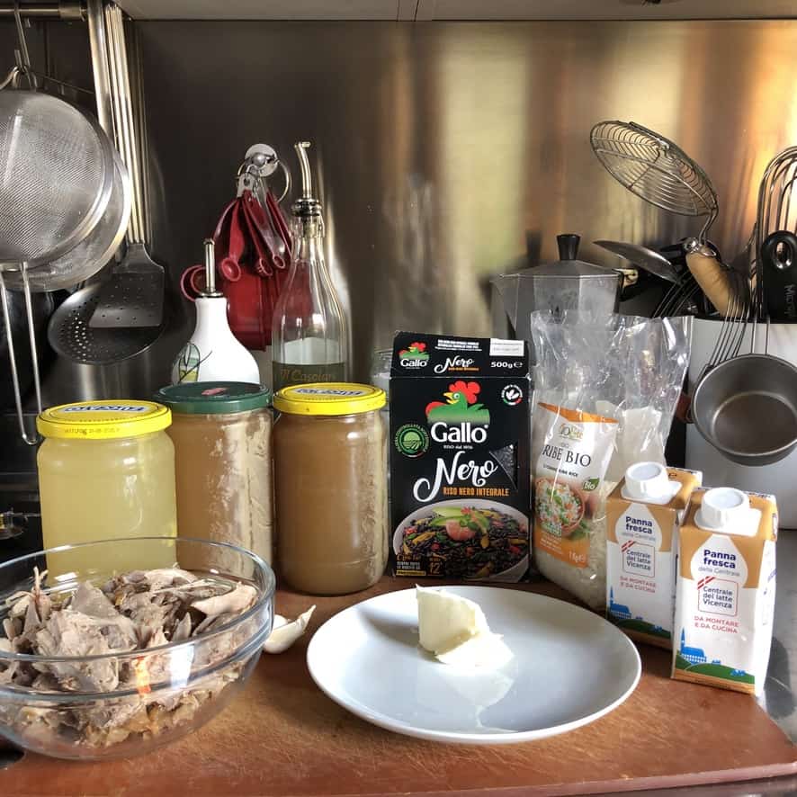turkey and rice soup ingredients on a cutting board