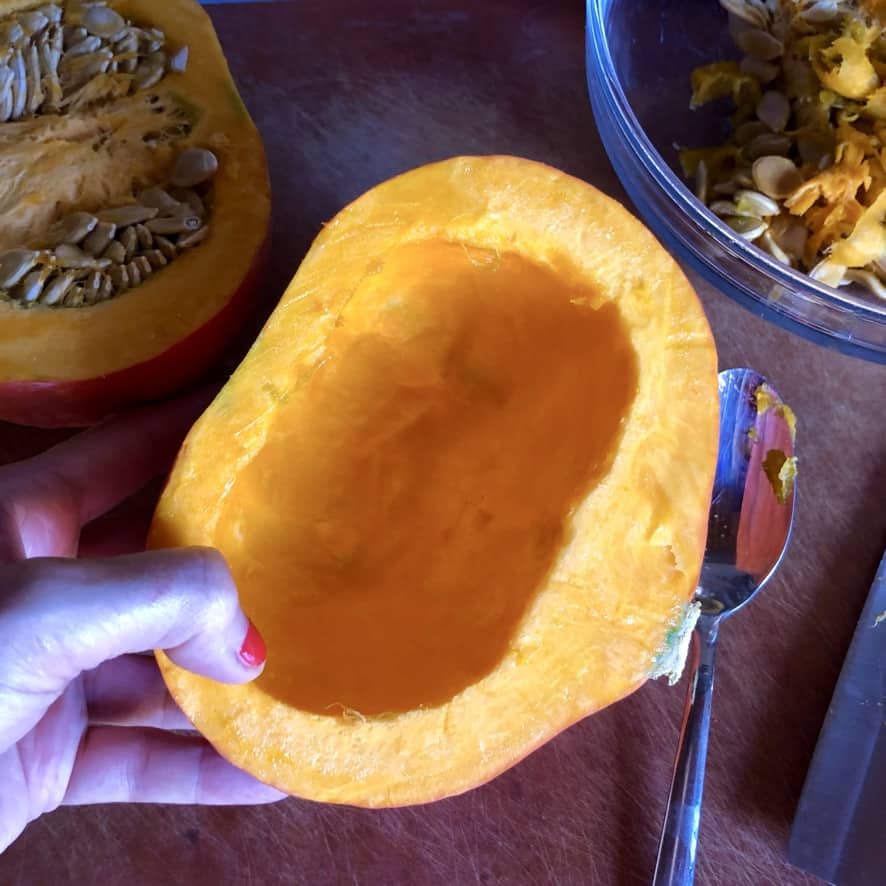 one half of a hakkaido pumkin with the seeds and skin removed