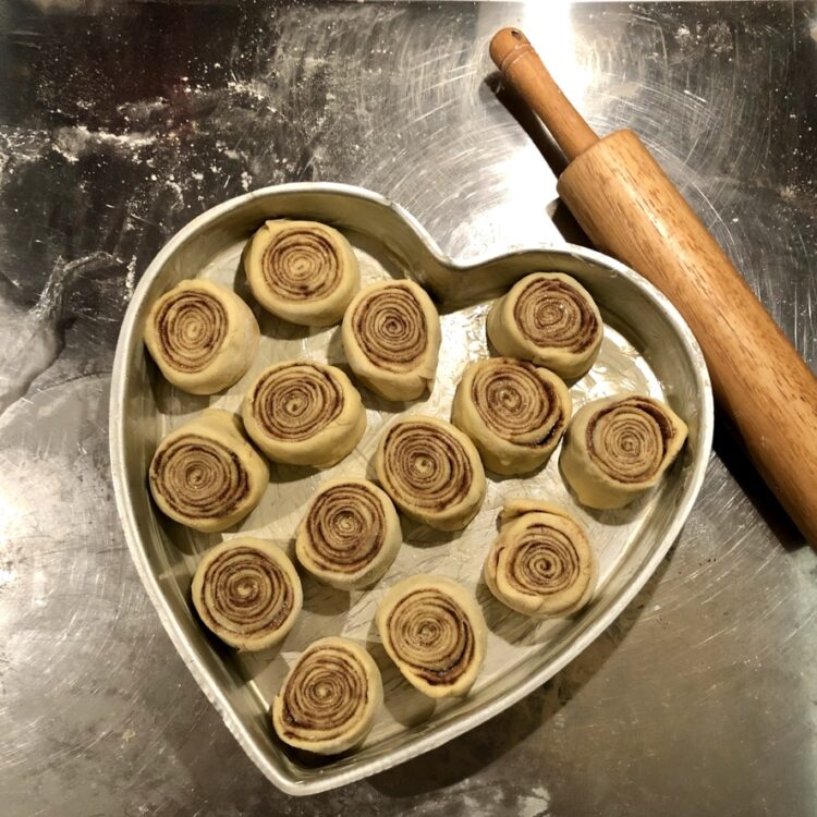 Just sliced still raw cinnamon rolls before rising a second time