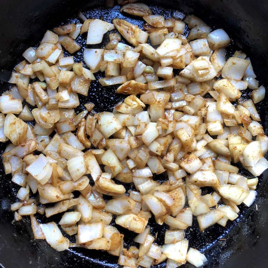 onions mixed together with the spice mixture in the skillet