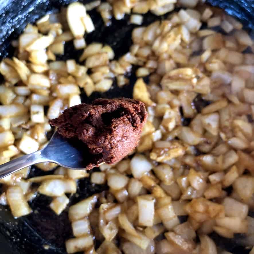 diy chipotle in adobo sauce added to the sauteed onion and spice mixture added to softened onion and spice mixture