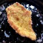healthier chicken katsu cooking in a very small amount of oil in a cast iron pan -- super golden and crispy
