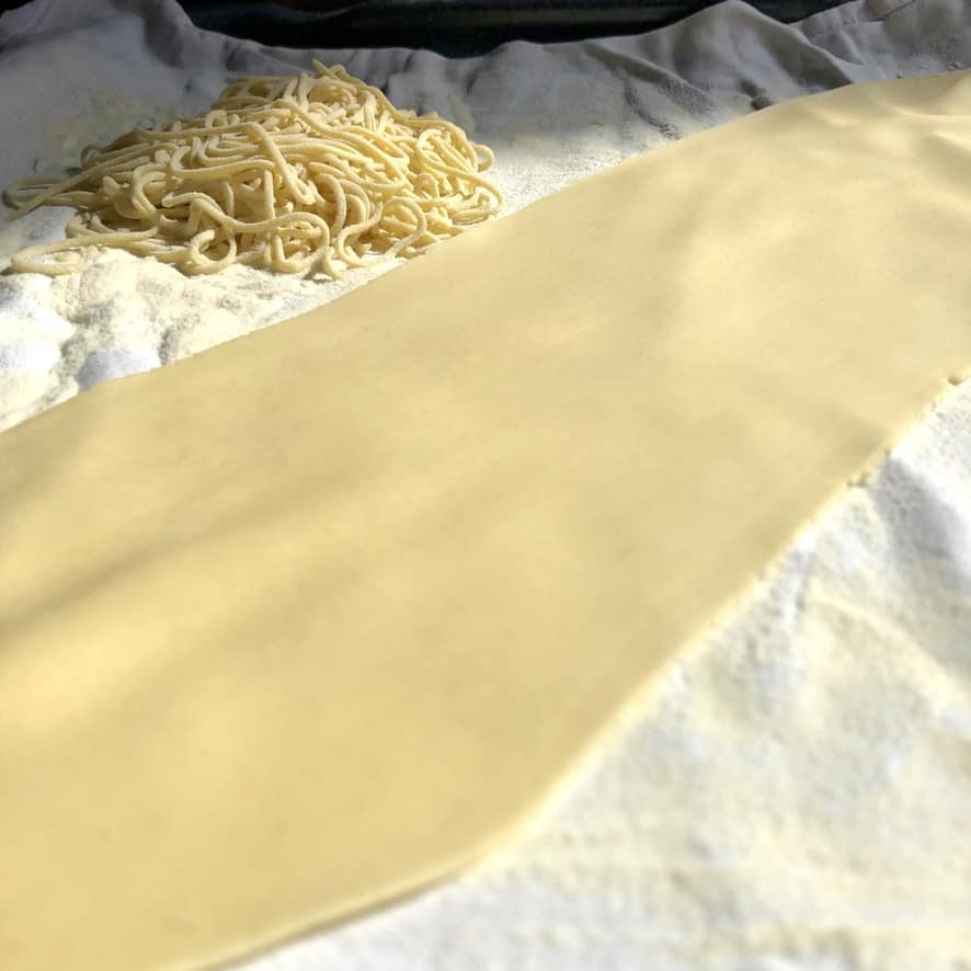 a smooth square of just rolled pasta dough that has been rolled on #6 and final setting (it's perfectly thin and very long)