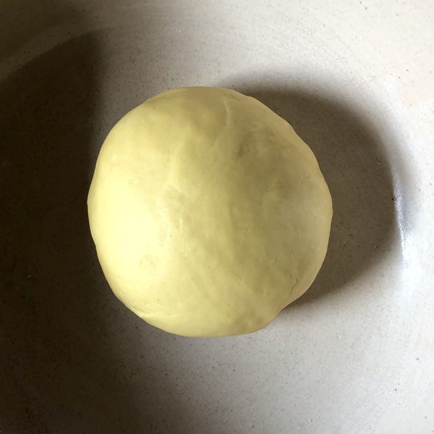 a beautifully, more intense yellow-colored fully rested egg pasta dough