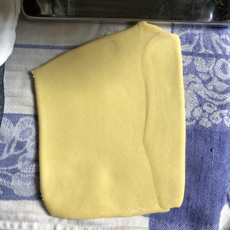 a smooth square of just rolled pasta dough