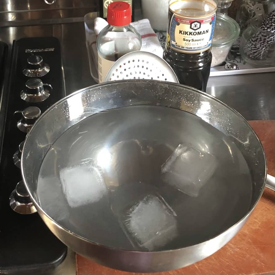 a bowl of ice water waiting for the soft boiled eggs