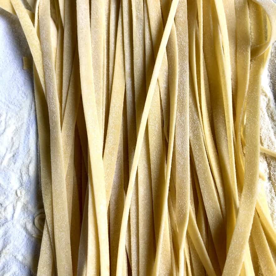 beautifully dried fettuccini shaped egg noodles up close