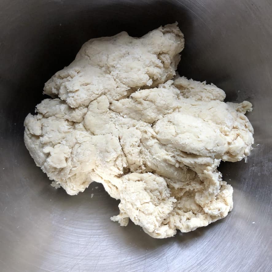 ramen dough just mixed together looking really shaggy and not yet very yellow