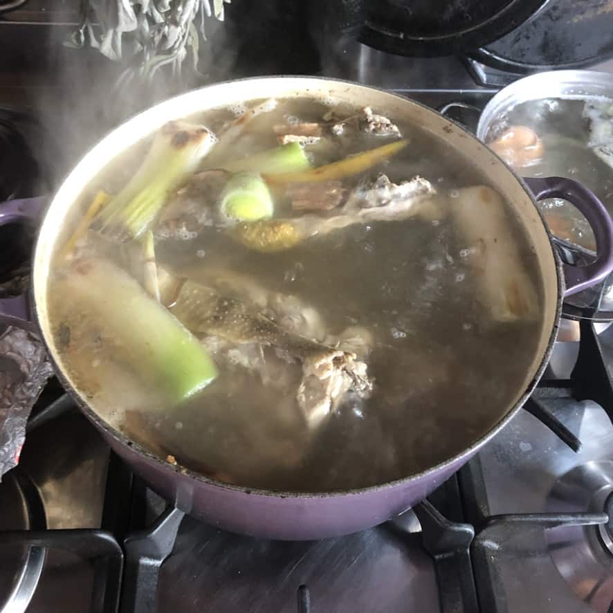 Ramen broth free of foam and impurities and ready to be covered and low-boiled. 