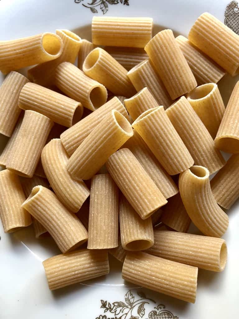 dry artisanal rigatoni pasta closeup