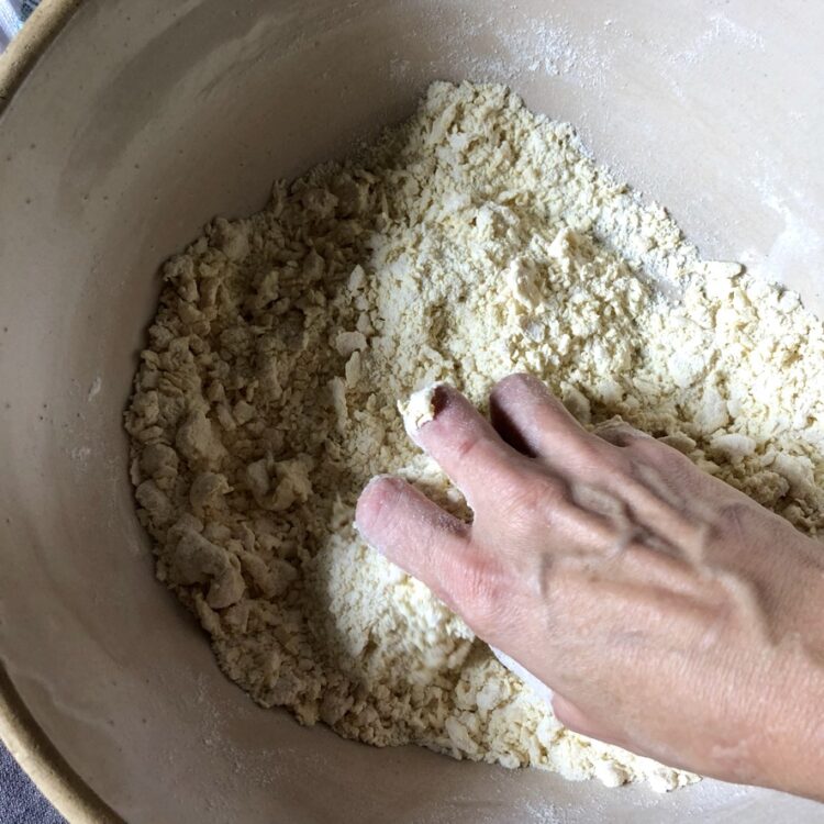 incorporating the eggs into the flour
