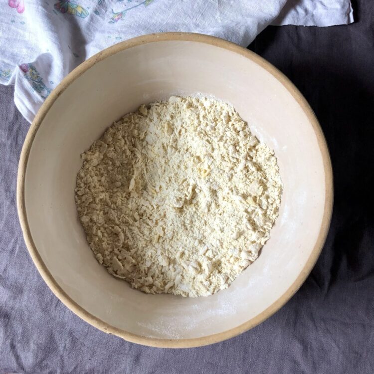 a top down view of the egg and flour mixture looking very crumbly