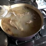 after 3 hours and 40 minutes I needed to add more water to the broth to keep the bones covered while they low boil