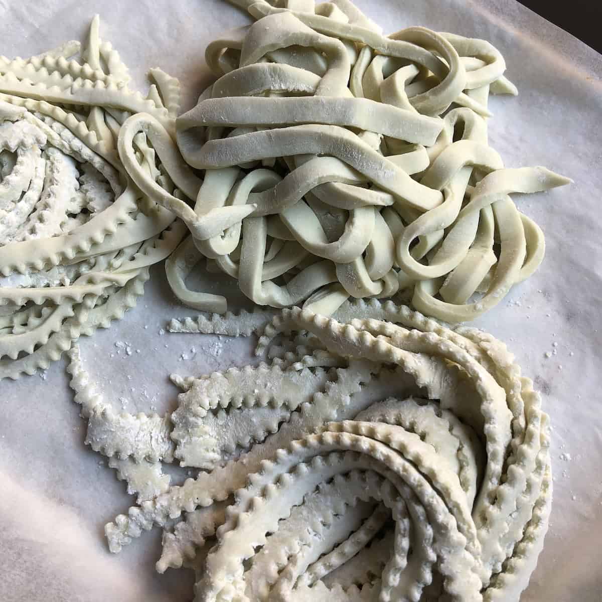 Homemade udon noodles fresh thick noodles finished and ready to cook showing how to make udon noodles from scratch without pasta machine hand cut fresh udon noodles recipe.
