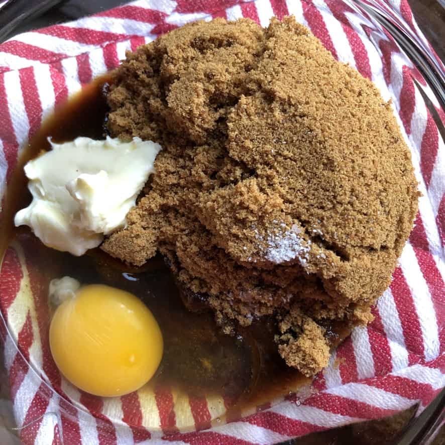 butter, egg, salt, and dark brown sugar in a bowl