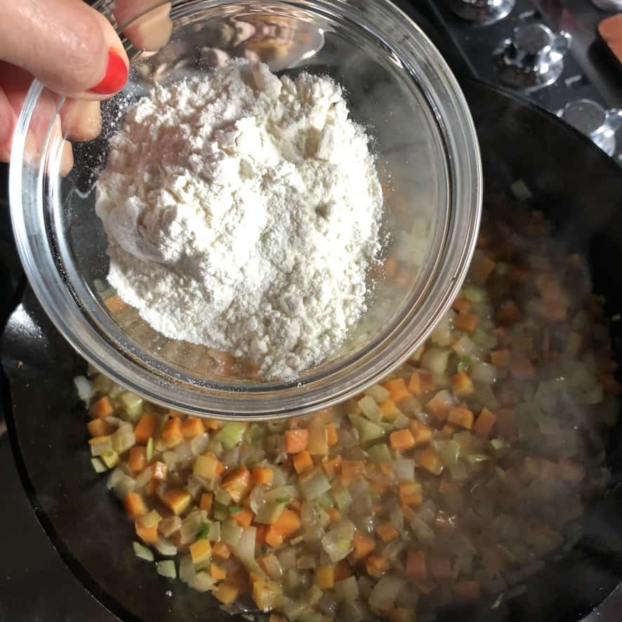 adding flour to create the roux