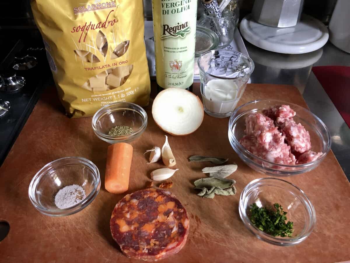 raw ingredients for the pasta assembled on a cutting board