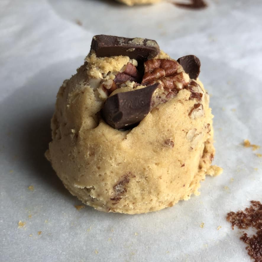 Chocolate chip pecan cookie dough after being chilled (looking slightly darker and firmer)