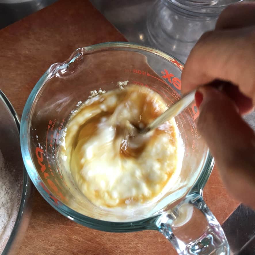 whisking the buttermilk and egg mixture together