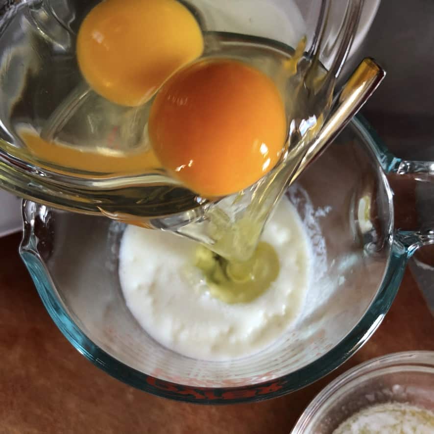 adding the eggs and vanilla to the buttermilk