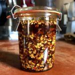 homemade Sichuan chili oil in a Weck jar