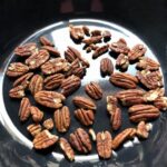 toasting pecans in a skillet.