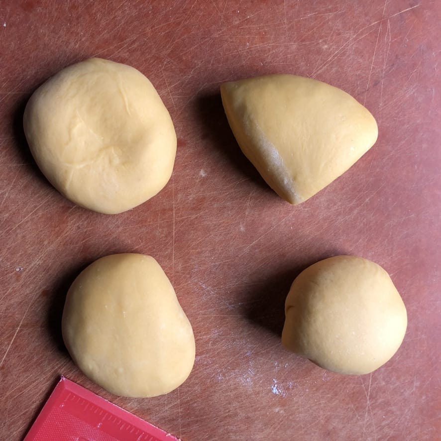portioned dough into 4 equal pieces