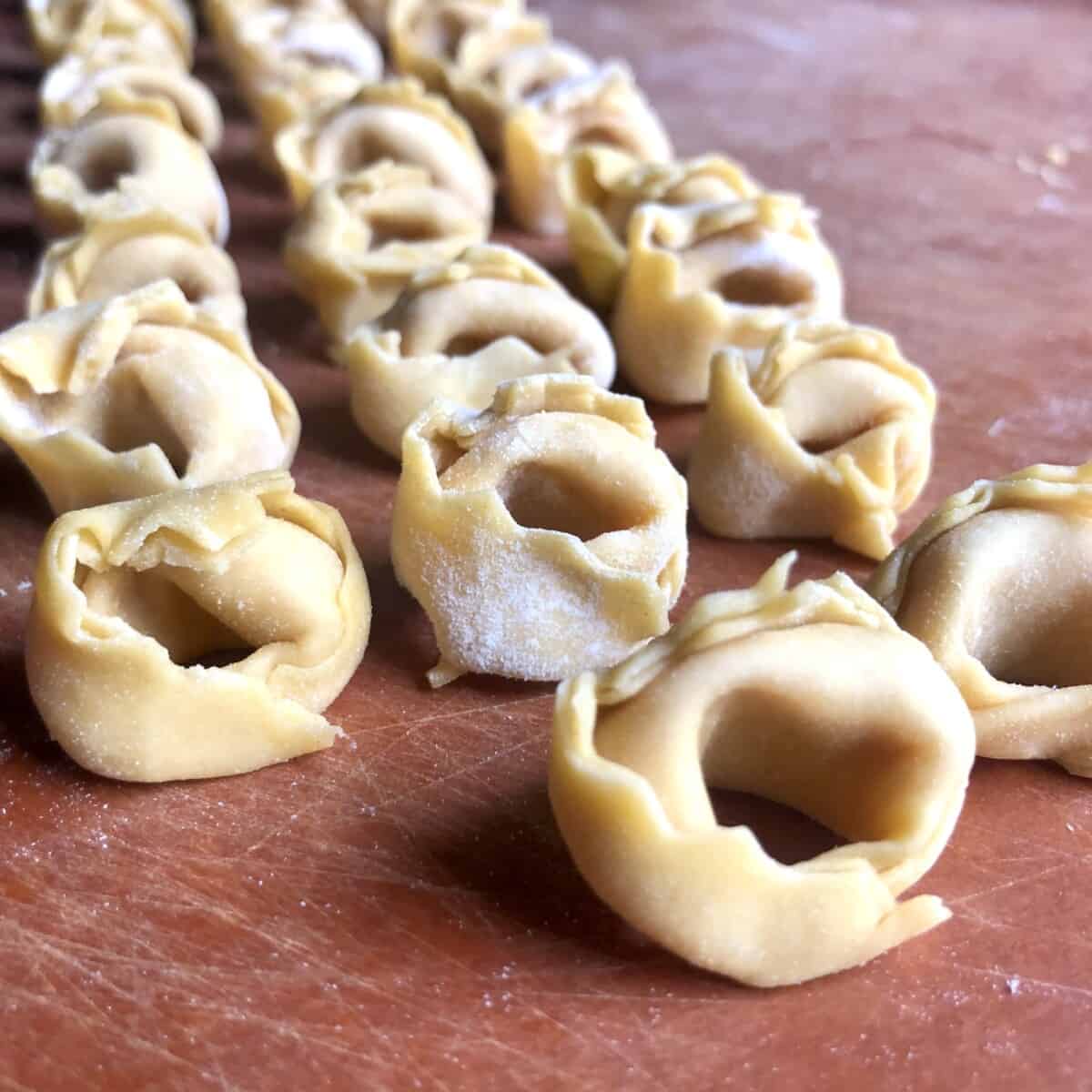 raw homemade tortellini alla Bolognese