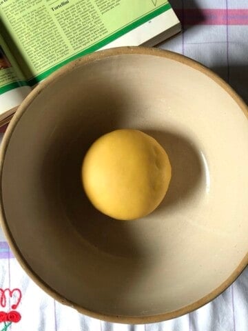 A well-rested semolina and 00 flour pasta dough ball ready to roll.